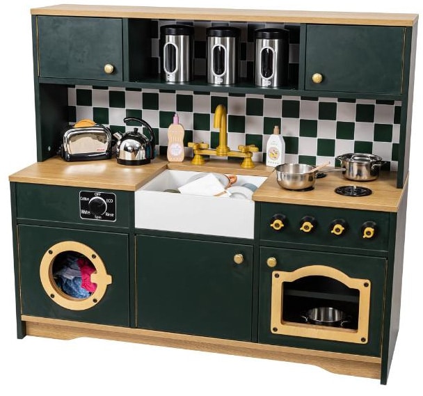 Wooden play kitchen with sink, washing machine and oven painted dark green with stainless steel toaster, kettle and pans accessories.